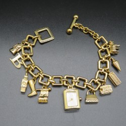 Burberry silver gilt charm bracelet with watch